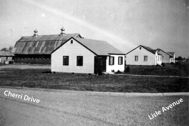 You can see the milk barn behind their property